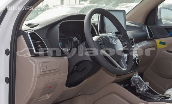 Buy Import Hyundai Tucson White Car in Import - Dubai in Attapeu Province Buy Import Hyundai Tucson White Car in Import - Dubai in Attapeu Province