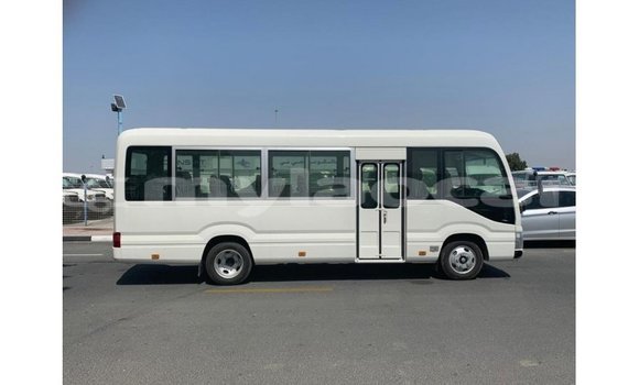 Buy Import Toyota Coaster White Car in Import - Dubai in Attapeu Province Buy Import Toyota Coaster White Car in Import - Dubai in Attapeu Province