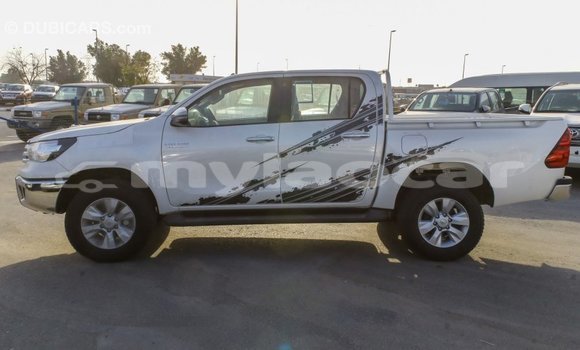 Buy Import Toyota Hilux White Car in Import - Dubai in Attapeu Province Buy Import Toyota Hilux White Car in Import - Dubai in Attapeu Province