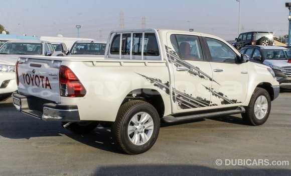 Buy Import Toyota Hilux White Car in Import - Dubai in Attapeu Province Buy Import Toyota Hilux White Car in Import - Dubai in Attapeu Province