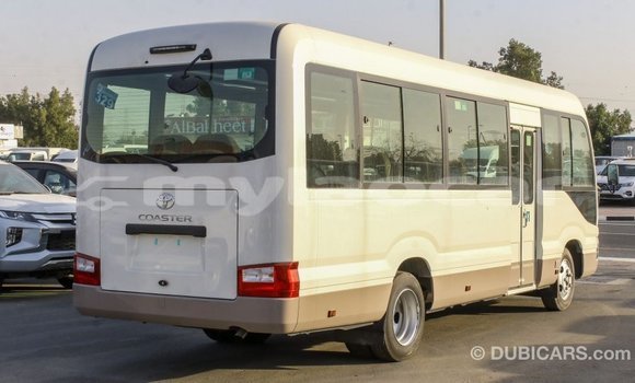 Buy Import Toyota Coaster White Car in Import - Dubai in Attapeu Province Buy Import Toyota Coaster White Car in Import - Dubai in Attapeu Province