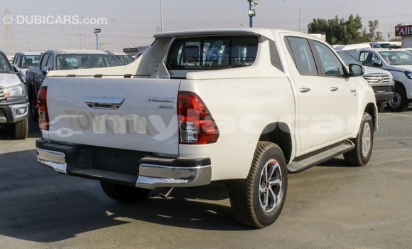 Buy Import Toyota Hilux White Car in Import - Dubai in Attapeu Province Buy Import Toyota Hilux White Car in Import - Dubai in Attapeu Province