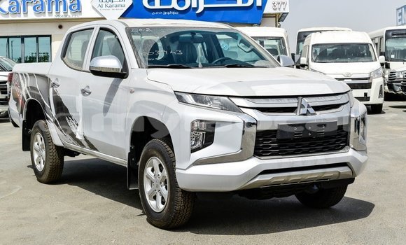 Buy Import Mitsubishi L200 White Car in Import - Dubai in Attapeu Province Buy Import Mitsubishi L200 White Car in Import - Dubai in Attapeu Province
