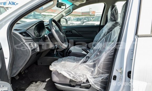 Buy Import Mitsubishi L200 White Car in Import - Dubai in Attapeu Province Buy Import Mitsubishi L200 White Car in Import - Dubai in Attapeu Province