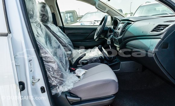 Buy Import Mitsubishi L200 White Car in Import - Dubai in Attapeu Province Buy Import Mitsubishi L200 White Car in Import - Dubai in Attapeu Province