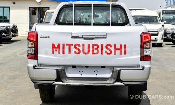 Buy Import Mitsubishi L200 White Car in Import - Dubai in Attapeu Province Buy Import Mitsubishi L200 White Car in Import - Dubai in Attapeu Province