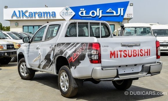 Buy Import Mitsubishi L200 White Car in Import - Dubai in Attapeu Province Buy Import Mitsubishi L200 White Car in Import - Dubai in Attapeu Province