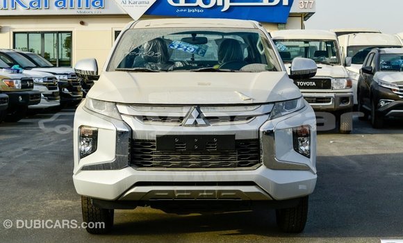 Buy Import Mitsubishi L200 White Car in Import - Dubai in Attapeu Province Buy Import Mitsubishi L200 White Car in Import - Dubai in Attapeu Province