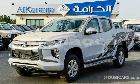 Buy Import Mitsubishi L200 White Car in Import - Dubai in Attapeu Province Buy Import Mitsubishi L200 White Car in Import - Dubai in Attapeu Province