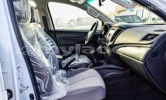 Buy Import Mitsubishi L200 White Car in Import - Dubai in Attapeu Province Buy Import Mitsubishi L200 White Car in Import - Dubai in Attapeu Province