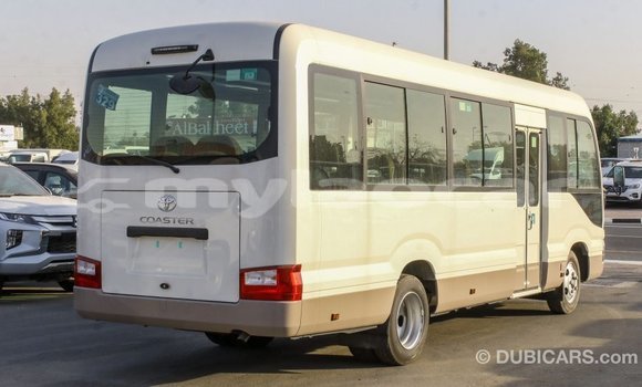 Buy Import Toyota Coaster White Car in Import - Dubai in Attapeu Province Buy Import Toyota Coaster White Car in Import - Dubai in Attapeu Province