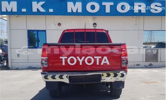 Acheter Import Voiture Toyota Hilux Rouge à Import - Dubai, Attapeu Province Acheter Import Voiture Toyota Hilux Rouge à Import - Dubai, Attapeu Province