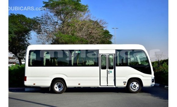 Acheter Import Voiture Toyota Coaster Blanc à Import - Dubai, Attapeu Province Acheter Import Voiture Toyota Coaster Blanc à Import - Dubai, Attapeu Province