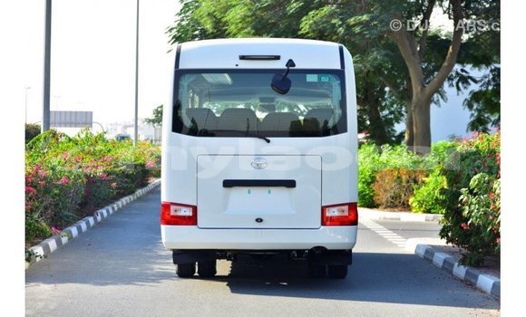 Acheter Import Voiture Toyota Coaster Blanc à Import - Dubai, Attapeu Province Acheter Import Voiture Toyota Coaster Blanc à Import - Dubai, Attapeu Province