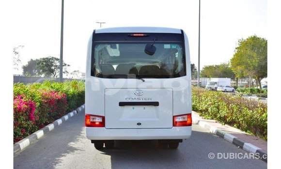 Acheter Import Voiture Toyota Coaster Blanc à Import - Dubai, Attapeu Province Acheter Import Voiture Toyota Coaster Blanc à Import - Dubai, Attapeu Province