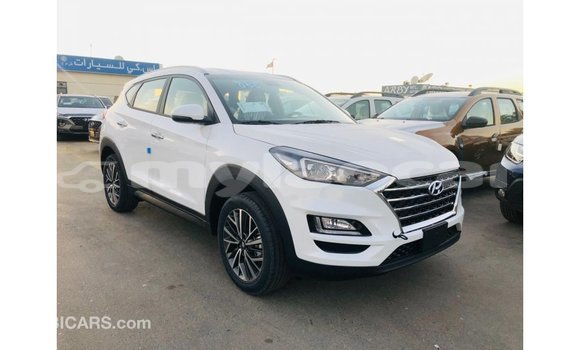 Buy Import Hyundai Tucson White Car in Import - Dubai in Attapeu Province Buy Import Hyundai Tucson White Car in Import - Dubai in Attapeu Province
