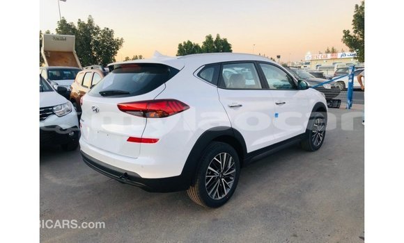 Buy Import Hyundai Tucson White Car in Import - Dubai in Attapeu Province Buy Import Hyundai Tucson White Car in Import - Dubai in Attapeu Province