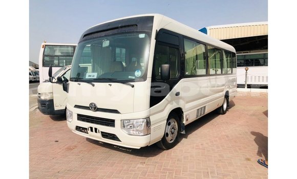 Buy Import Toyota Coaster White Car in Import - Dubai in Attapeu Province Buy Import Toyota Coaster White Car in Import - Dubai in Attapeu Province