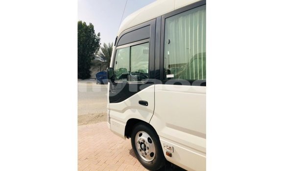 Buy Import Toyota Coaster White Car in Import - Dubai in Attapeu Province Buy Import Toyota Coaster White Car in Import - Dubai in Attapeu Province