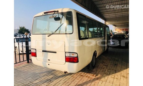 Buy Import Toyota Coaster White Car in Import - Dubai in Attapeu Province Buy Import Toyota Coaster White Car in Import - Dubai in Attapeu Province