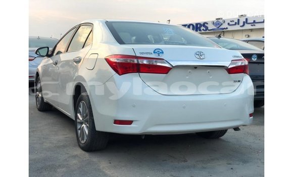 Buy Import Toyota Corolla White Car in Import - Dubai in Attapeu Province Buy Import Toyota Corolla White Car in Import - Dubai in Attapeu Province