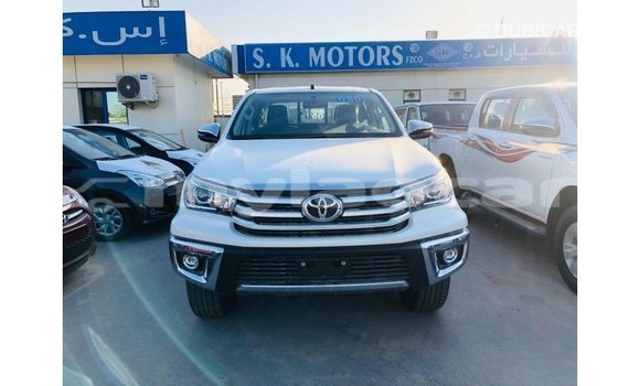 Buy Import Toyota Hilux White Car in Import - Dubai in Attapeu Province Buy Import Toyota Hilux White Car in Import - Dubai in Attapeu Province