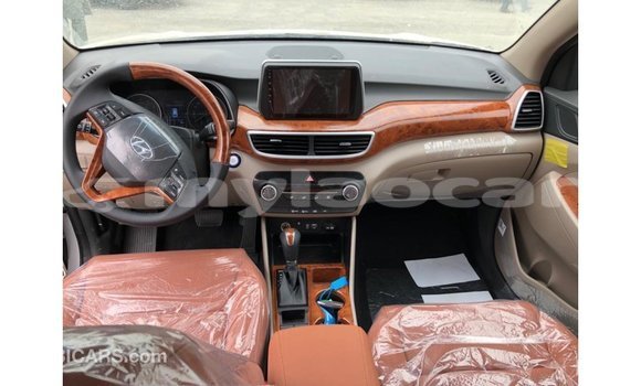 Buy Import Hyundai Tucson White Car in Import - Dubai in Attapeu Province Buy Import Hyundai Tucson White Car in Import - Dubai in Attapeu Province