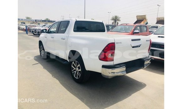 Buy Import Toyota Hilux White Car in Import - Dubai in Attapeu Province Buy Import Toyota Hilux White Car in Import - Dubai in Attapeu Province