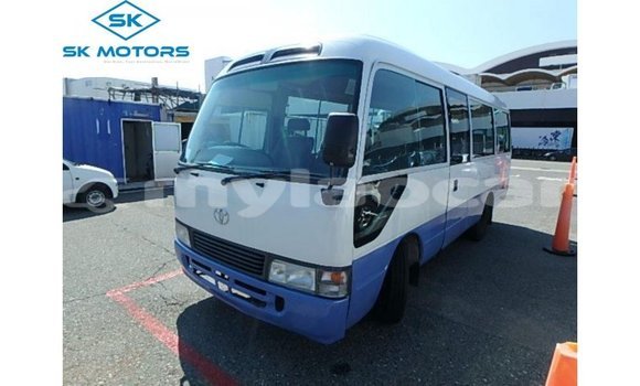 Buy Import Toyota Coaster White Car in Import - Dubai in Attapeu Province