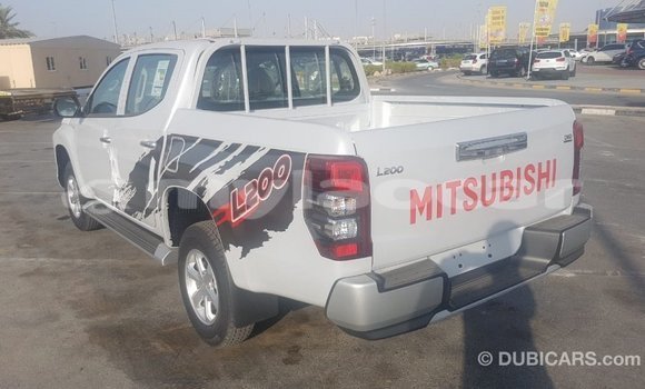 Buy Import Mitsubishi L200 White Car in Import - Dubai in Attapeu Province Buy Import Mitsubishi L200 White Car in Import - Dubai in Attapeu Province