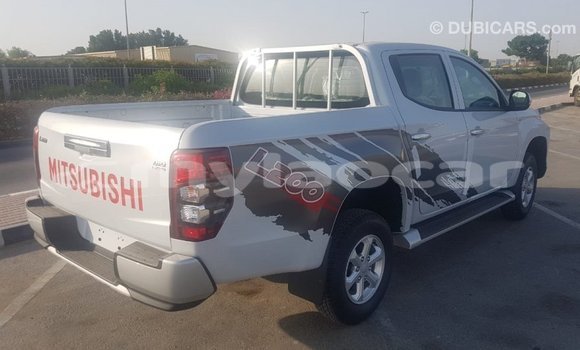 Buy Import Mitsubishi L200 White Car in Import - Dubai in Attapeu Province Buy Import Mitsubishi L200 White Car in Import - Dubai in Attapeu Province