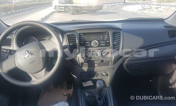 Buy Import Mitsubishi L200 White Car in Import - Dubai in Attapeu Province Buy Import Mitsubishi L200 White Car in Import - Dubai in Attapeu Province
