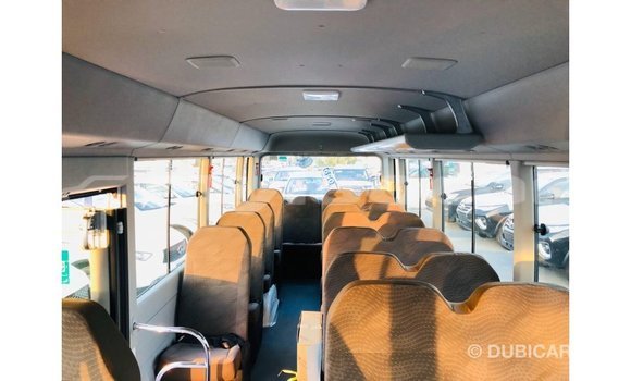Buy Import Toyota Coaster White Car in Import - Dubai in Attapeu Province Buy Import Toyota Coaster White Car in Import - Dubai in Attapeu Province