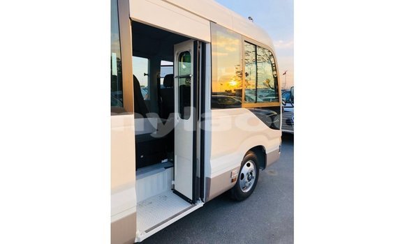 Buy Import Toyota Coaster White Car in Import - Dubai in Attapeu Province Buy Import Toyota Coaster White Car in Import - Dubai in Attapeu Province