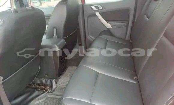 Buy Used Nissan Frontier Red Car in Luang Prabang in Louangphabang Province Buy Used Nissan Frontier Red Car in Luang Prabang in Louangphabang Province