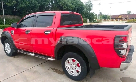 Buy Used Nissan Frontier Red Car in Luang Prabang in Louangphabang Province Buy Used Nissan Frontier Red Car in Luang Prabang in Louangphabang Province