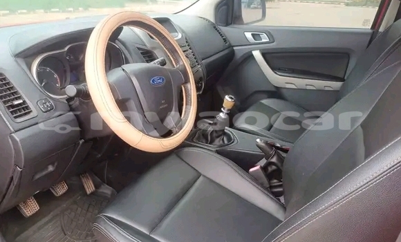 Buy Used Nissan Frontier Red Car in Luang Prabang in Louangphabang Province Buy Used Nissan Frontier Red Car in Luang Prabang in Louangphabang Province