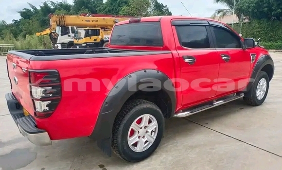 Buy Used Nissan Frontier Red Car in Luang Prabang in Louangphabang Province Buy Used Nissan Frontier Red Car in Luang Prabang in Louangphabang Province