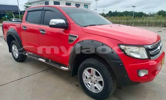Buy Used Nissan Frontier Red Car in Luang Prabang in Louangphabang Province Buy Used Nissan Frontier Red Car in Luang Prabang in Louangphabang Province