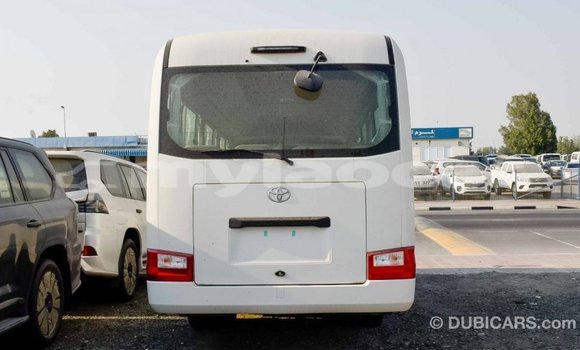 Buy Import Toyota Coaster White Car in Import - Dubai in Attapeu Province Buy Import Toyota Coaster White Car in Import - Dubai in Attapeu Province