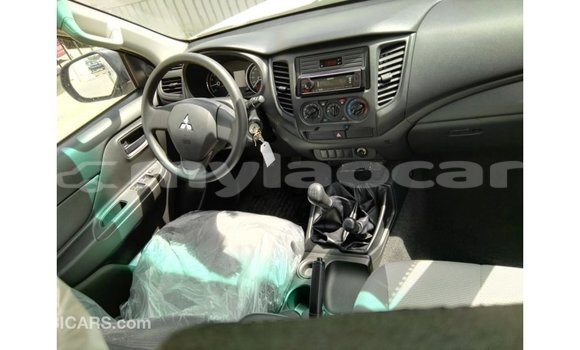 Buy Import Mitsubishi L200 White Car in Import - Dubai in Attapeu Province Buy Import Mitsubishi L200 White Car in Import - Dubai in Attapeu Province